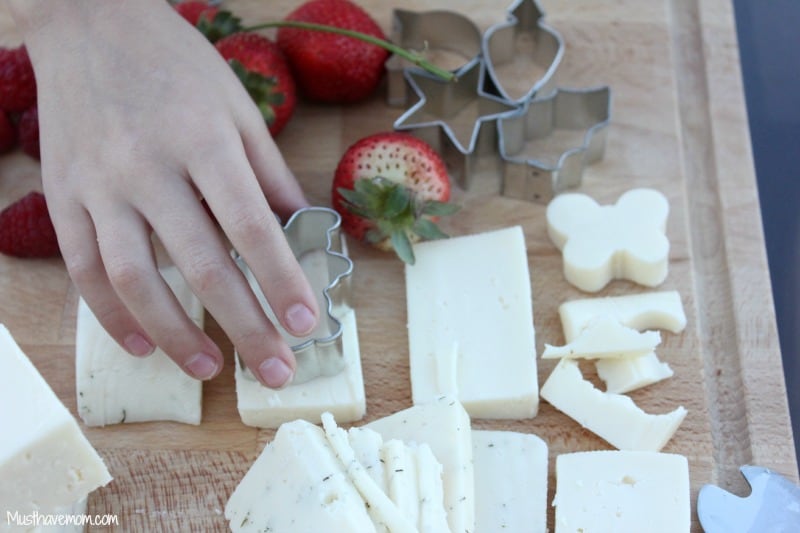 Cut out cheese slices with mini cookie cutters -Musthavemom.com