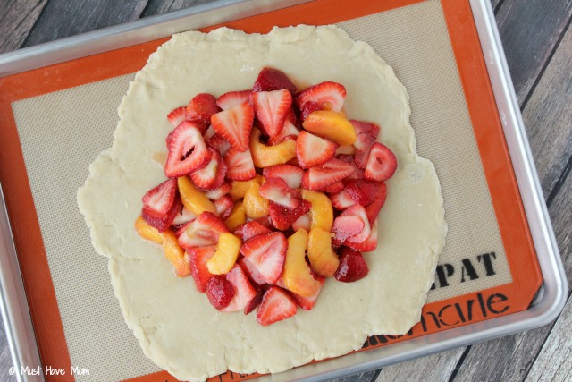 Strawberry Peach Galette Recipe. Easier than pie and tastier too! Uses no lard in the crust either. Great Summer dessert idea for all of that fresh fruit! You can use any kind of fruit!