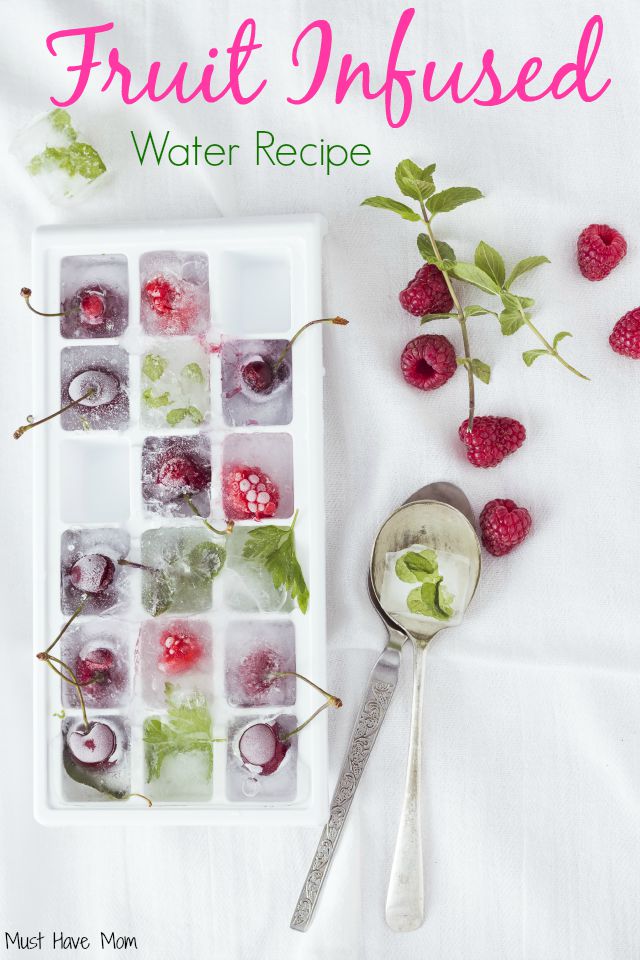 Homemade fruit infused water. Make your own fruit ice cubes to add to your water plus a recipe to add a kick to your water. Helps increase daily water intake!