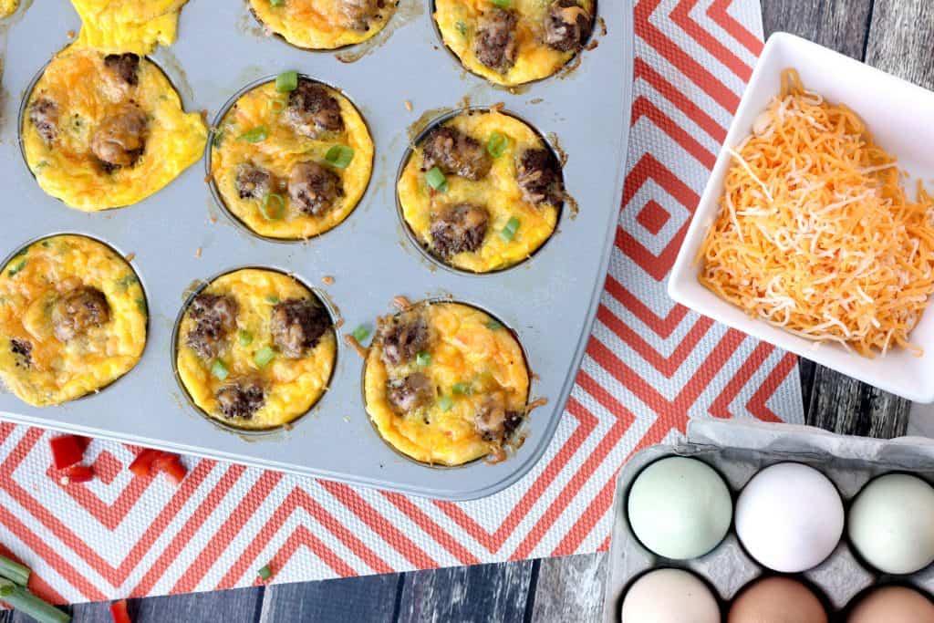 Easy Mini Sausage Egg & Veggie Omelettes Recipe. Quick on the go breakfast that is easy and doubles as a freezer breakfast recipe. Homemade convenience food! These taste amazing! 