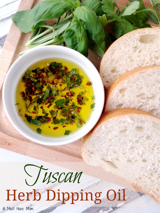 Tuscan Herb Dipping Oil Recipe. SO amazing! Pair with bread for dipping and it tastes like the herb oil you get at fancy restaurants. Easy entertaining idea or hostess gift!