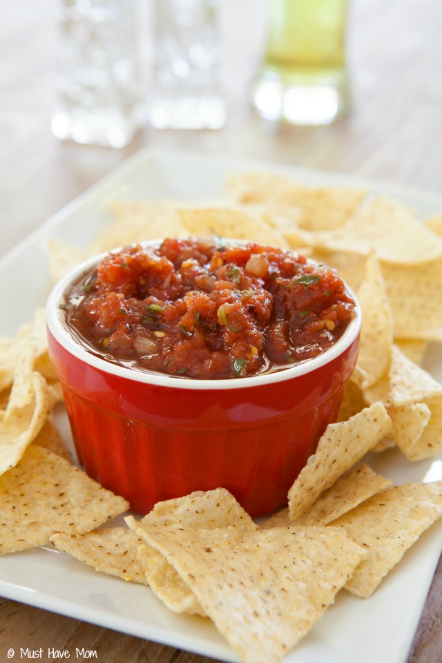 The BEST restaurant style salsa recipe! It is made with things you have on hand and it's way better than store bought salsa! Tastes like authentic Mexican restaurant salsa.