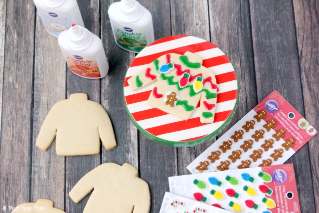 How to host an ugly Christmas sweater party. Ugly sweater party food ideas, ugly sweater voting box, ugly sweater games, prizes, and ugly sweater printables!