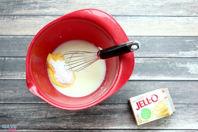 Easy Snowball Cake Recipe with a delicious cream cheese center and a Cool Whip Coconut Frosting! Easy one bowl dessert!