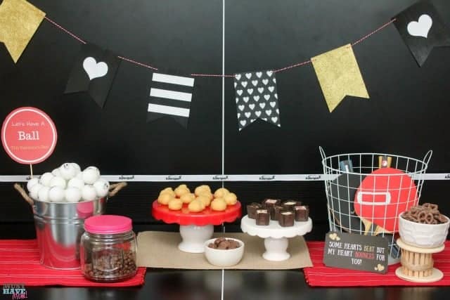 Valentine's Day Date Night In Idea with free printables! Have a fun ping pong date night at home. Free ping pong ball printables to create your themed date night. No sitter on Valentine's Day doesn't mean you can't have a fun date night at home!