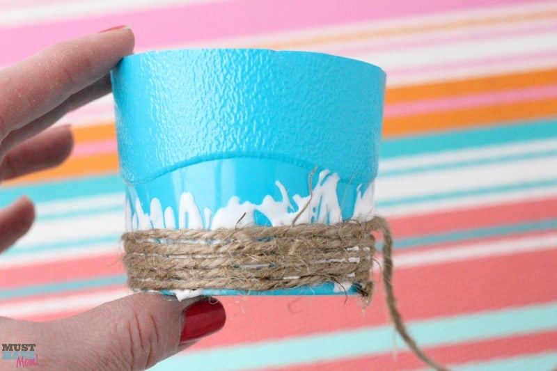 DIY Mini Easter Basket idea using a plastic cup and jute. Transform a cup into a beautiful mini easter basket and fill it with mini candy bars!