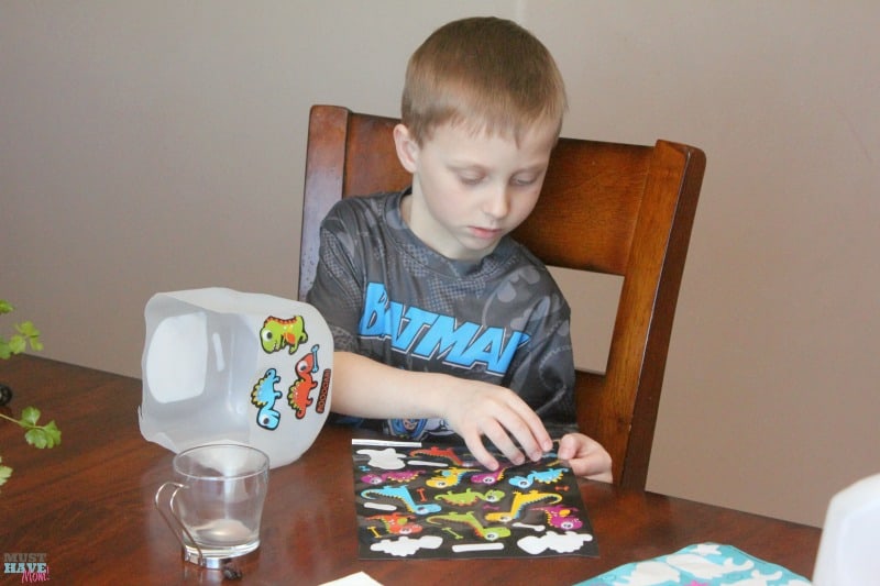 DIY Self Watering Milk Jug Planter Idea! Make your own self watering planter out of a milk jug. Upcycle and reuse your milk jug and get the kids involved! Milk jug gardening ideas!