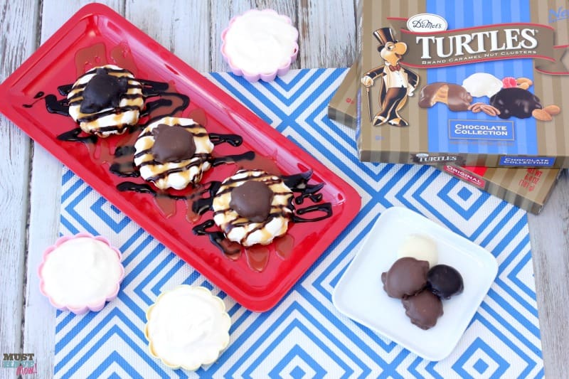 Chocolate and Caramel TURTLES® easy mini cheesecakes recipe! These no bake mini cheesecakes are the perfect easy dessert idea! Quick easy dessert that looks fancy!