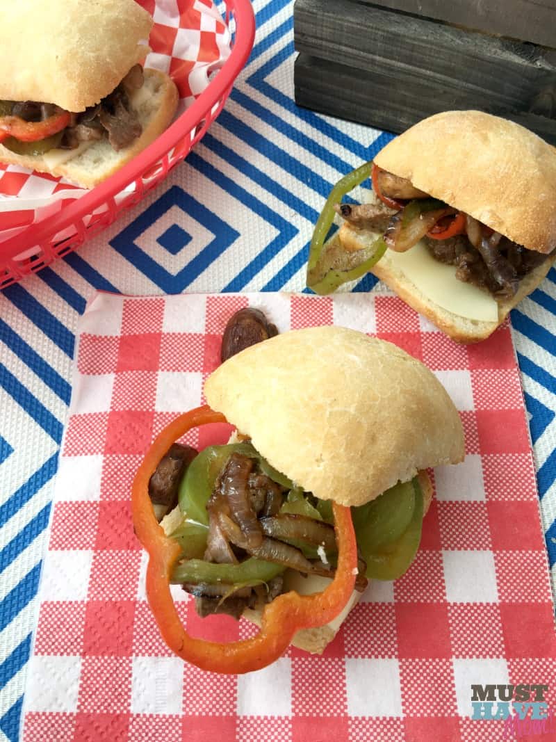 Easy 30 minute Philly Cheesesteak Burgers! Mix up your 4th of July food with this fun idea that you can even make ahead and warm later!