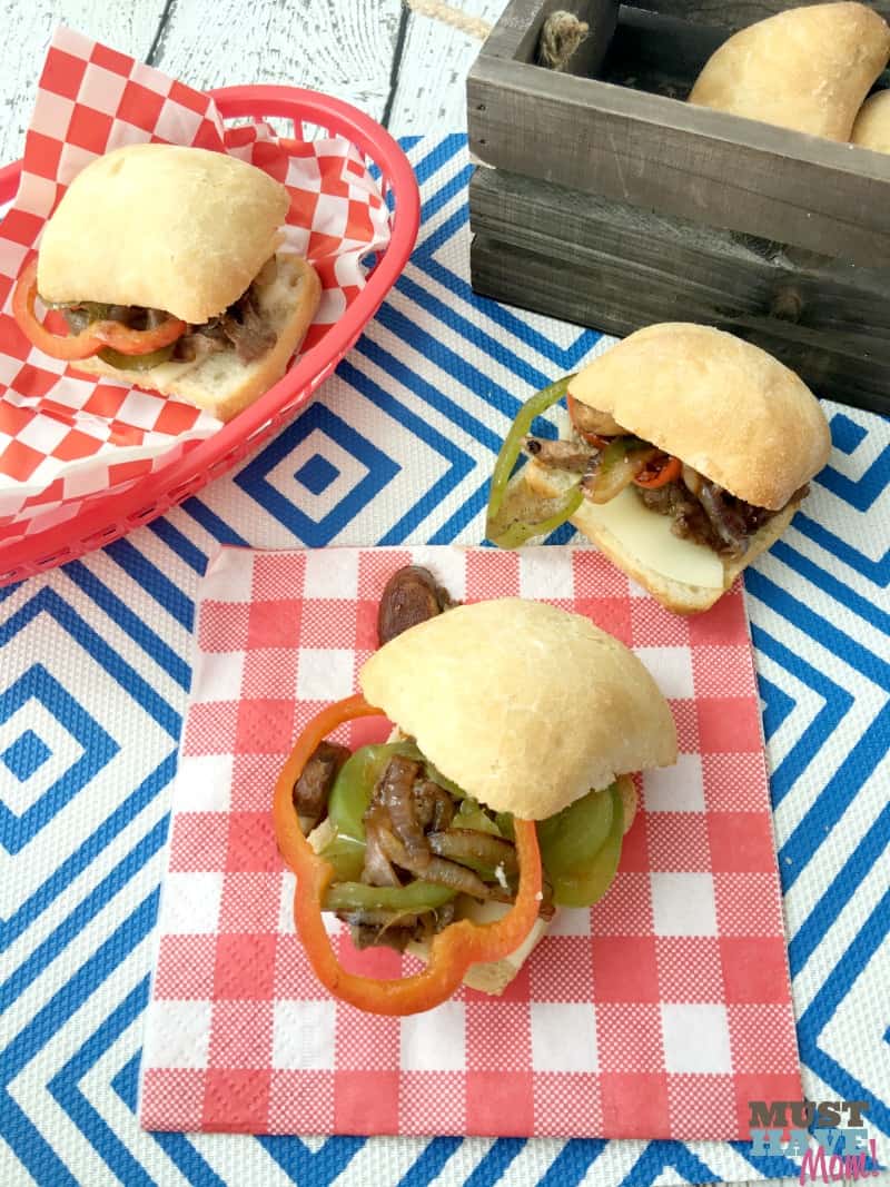 Easy 30 minute Philly Cheesesteak Burgers! Mix up your 4th of July food with this fun idea that you can even make ahead and warm later!