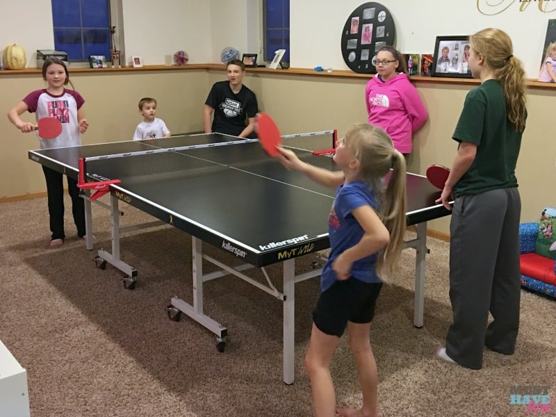 How to host a family ping pong tournament plus free printable ping pong tournament bracket. This is a great way to get the kids to put their phones and devices away and play!