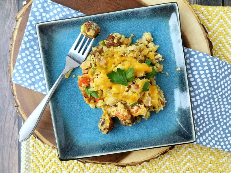 Easy one skillet sausage and egg breakfast hash recipe. Quick and easy breakfast with hashbrowns, eggs, sausage meatballs, veggies combined in a one pot meal! Hearty breakfast and can make it over a campfire too!