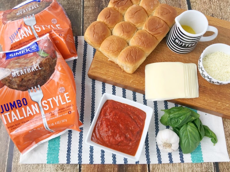 Delicious Parmesan and Garlic Meatball Sliders recipe! Perfect for party food or family dinner recipes. These are quick and easy to make and they taste amazing! Italian dinner recipe without pasta!