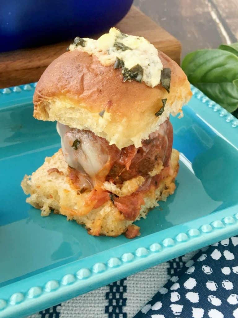 Delicious Parmesan and Garlic Meatball Sliders recipe! Perfect for party food or family dinner recipes. These are quick and easy to make and they taste amazing! Italian dinner recipe without pasta!