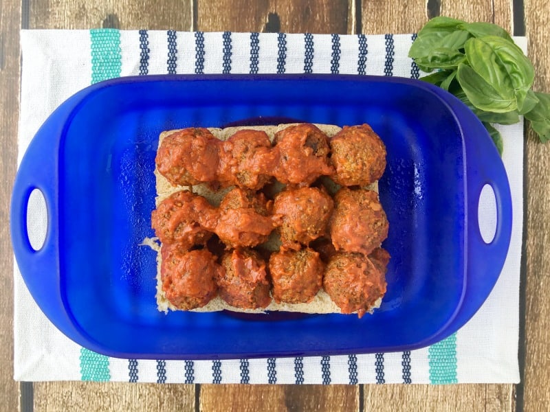 Delicious Parmesan and Garlic Meatball Sliders recipe! Perfect for party food or family dinner recipes. These are quick and easy to make and they taste amazing! Italian dinner recipe without pasta!