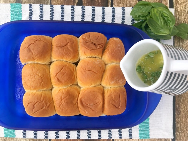 Delicious Parmesan and Garlic Meatball Sliders recipe! Perfect for party food or family dinner recipes. These are quick and easy to make and they taste amazing! Italian dinner recipe without pasta!