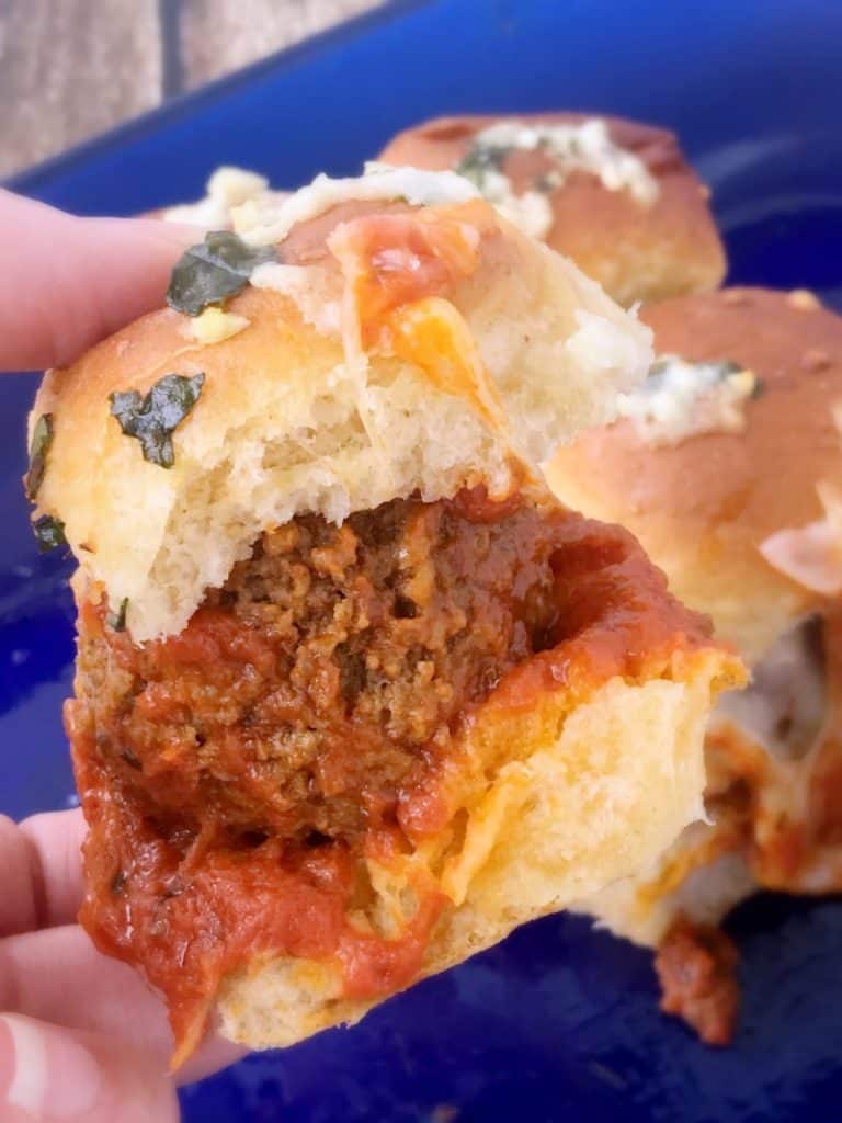 Delicious Parmesan and Garlic Meatball Sliders recipe! Perfect for party food or family dinner recipes. These are quick and easy to make and they taste amazing! Italian dinner recipe without pasta!