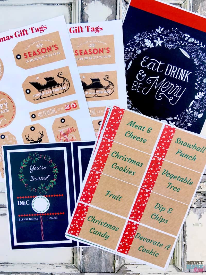 Free rustic Christmas party printables and rustic gift tag printables. These are so charming! Pair with burlap and chalboards for a rustic look! Free christmas invitations, party food signs, gift tags, place setting, signs and more!