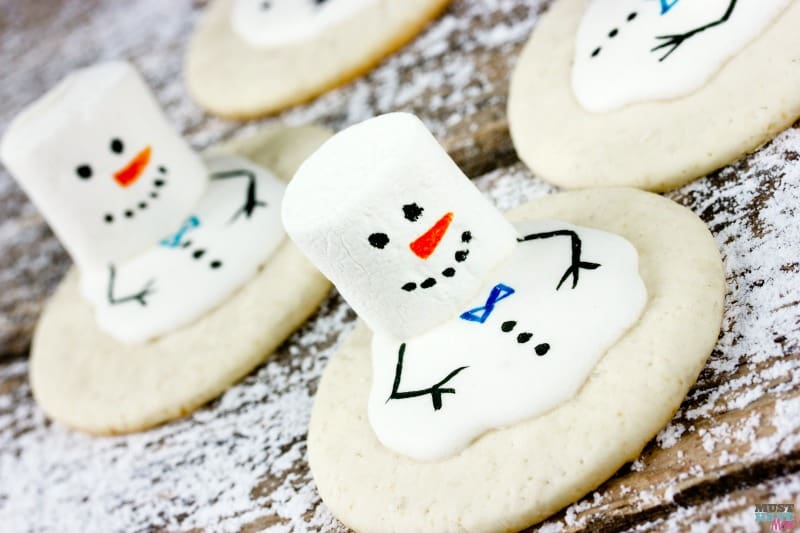 Melting snowman cookies recipe. Great kids Christmas cookie idea. These melted snowman cookies will put a smile on your face! 