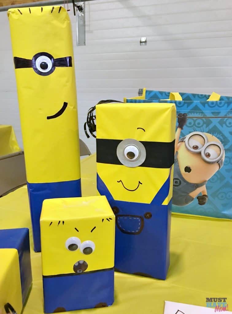 DIY Minion Gift Wrap idea with instructions to wrap any gift to look like a minion! Love this fun and easy gift wrap idea! Turn any gift into a minion! Great idea for minion birthday party.