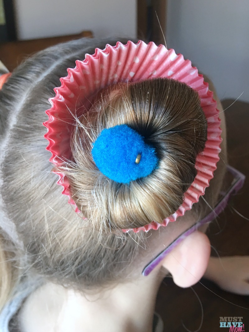 Crazy hair day ideas girls cupcake buns! These cupcake hair buns are quick and easy for crazy hair day at school!