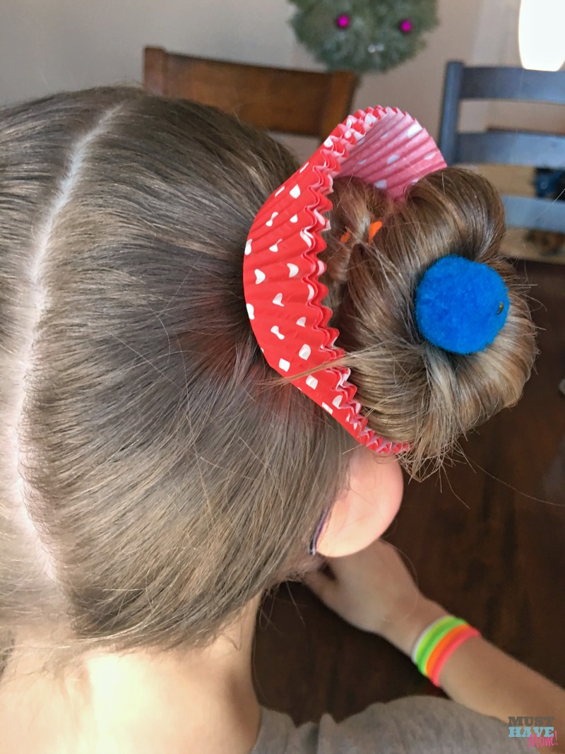 Crazy hair day ideas girls cupcake buns! These cupcake hair buns are quick and easy for crazy hair day at school!