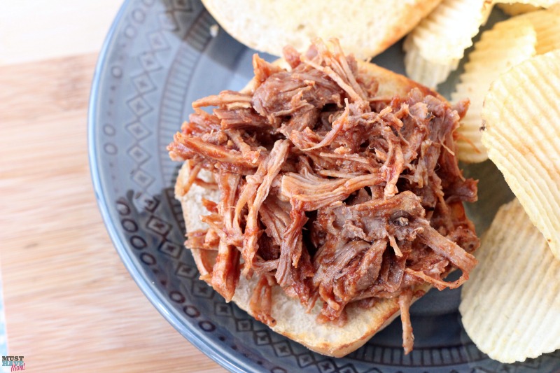 This Instant Pot BBQ pulled pork recipe is the BEST out there! The pressure cooker pulled pork literally fell apart and was so juicy and moist. Very flavorful dinner idea! Pin this recipe to favorites!