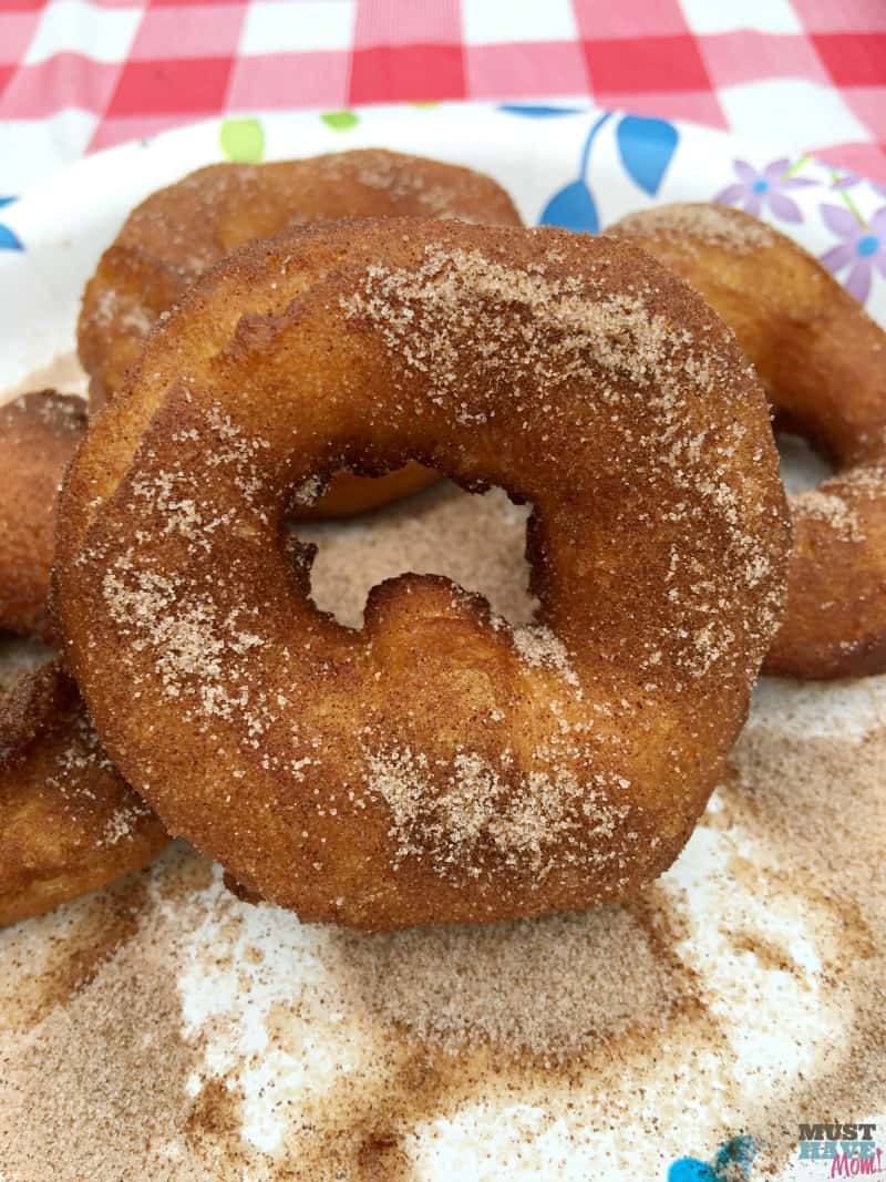 Easy campfire recipes! These campfire donuts are our kids favorite of all our camping recipes! Great camping breakfast or dessert idea.