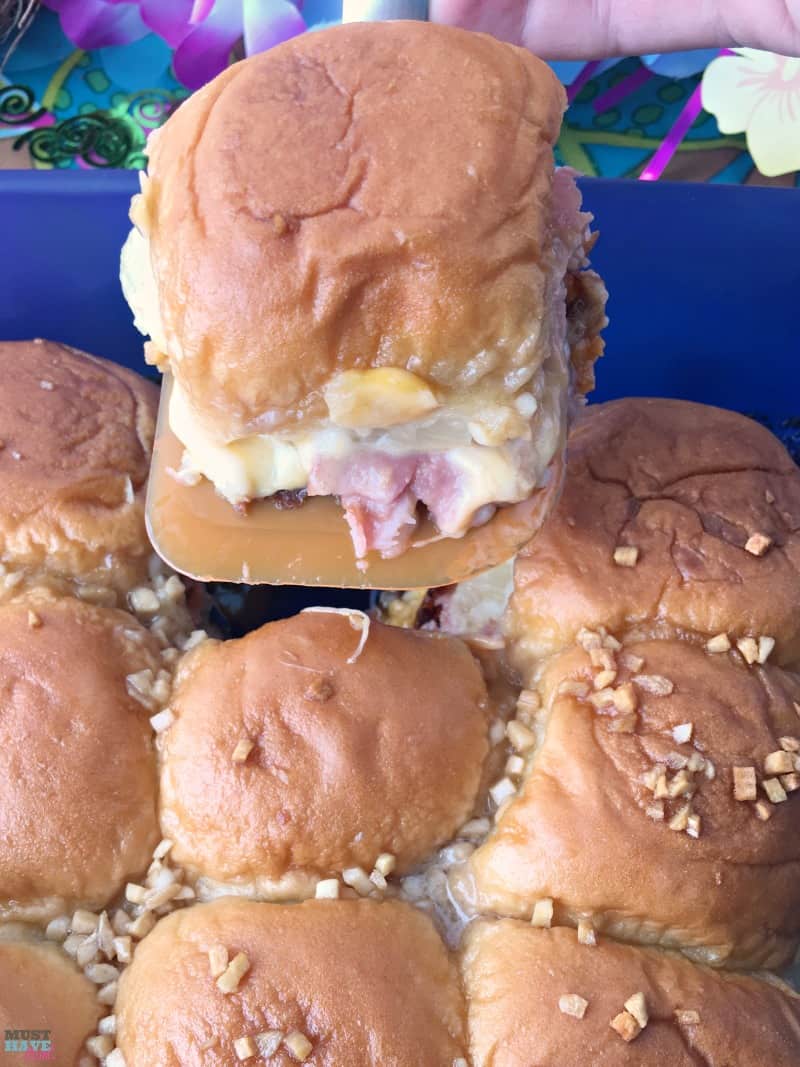 Easy Hawaiian Sliders recipe! Great party food idea or food for a crowd. We made these ham and cheese sliders with pineapple for our Moana party food. 
