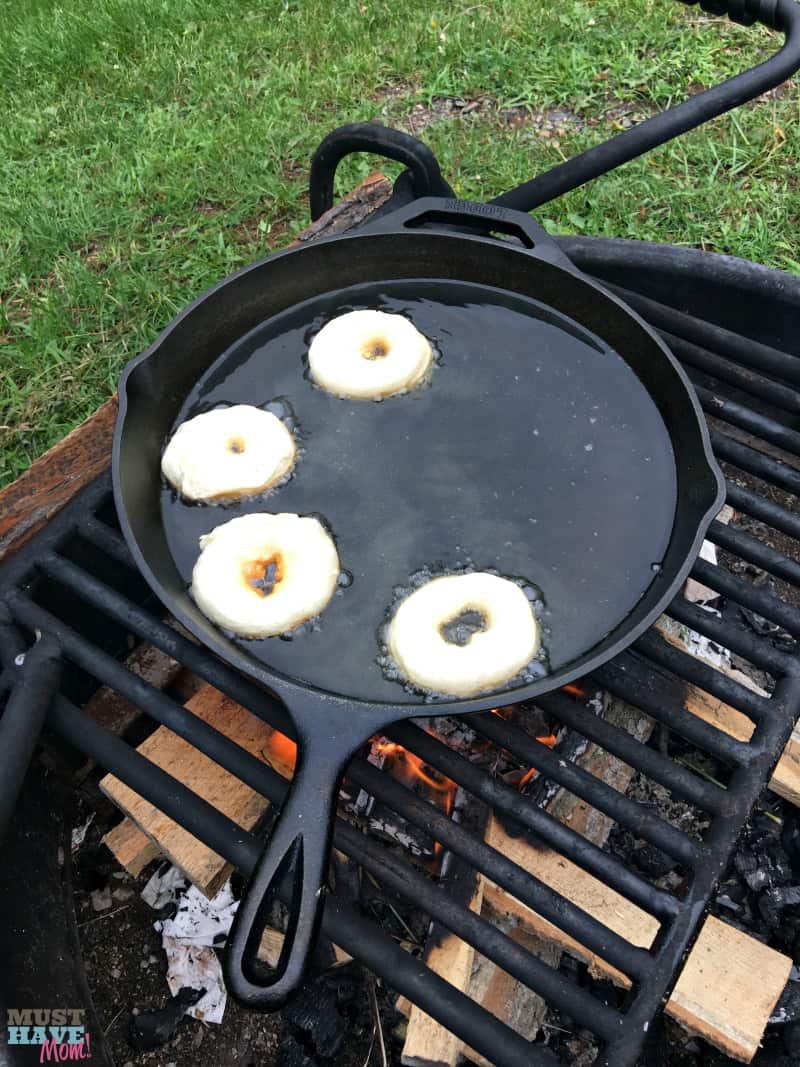 Easy campfire recipes! These campfire donuts are our kids favorite of all our camping recipes! Great camping breakfast or dessert idea.