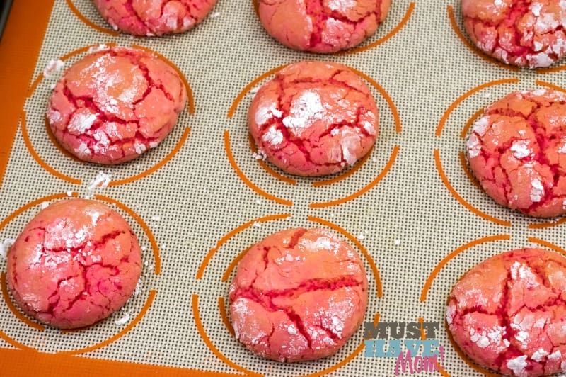 These easy strawberry crinkle cake mix cookies are the perfect way to get the kids cooking in the kitchen and make the perfect summer treat. 