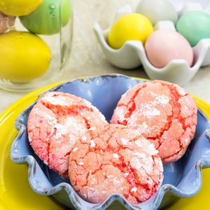 These easy strawberry crinkle cake mix cookies are the perfect way to get the kids cooking in the kitchen and make the perfect summer treat.