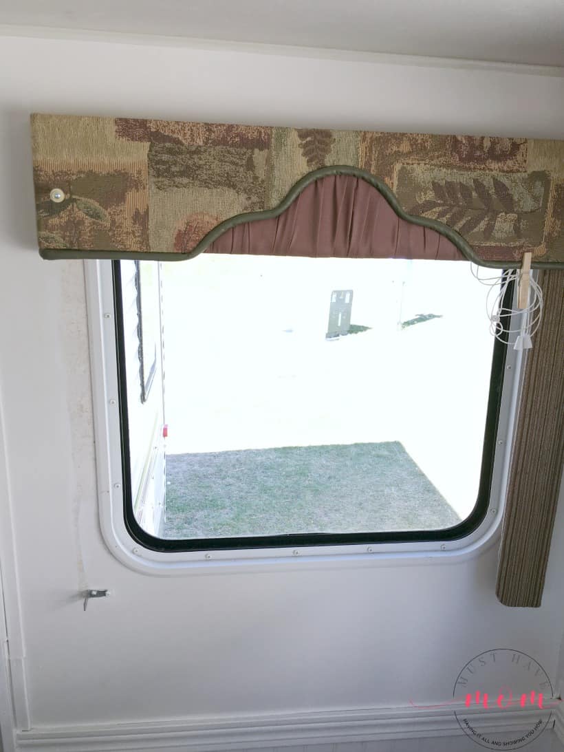 How to remove outdated RV window coverings from your camper. It's easy to remove rv window valances and let light in!