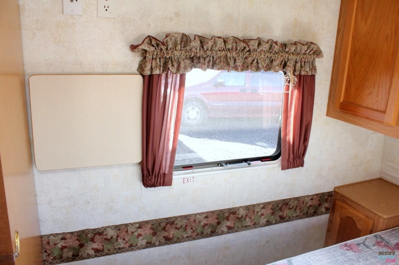 How to remove outdated RV window coverings from your camper. It's easy to remove rv window valances and let light in!