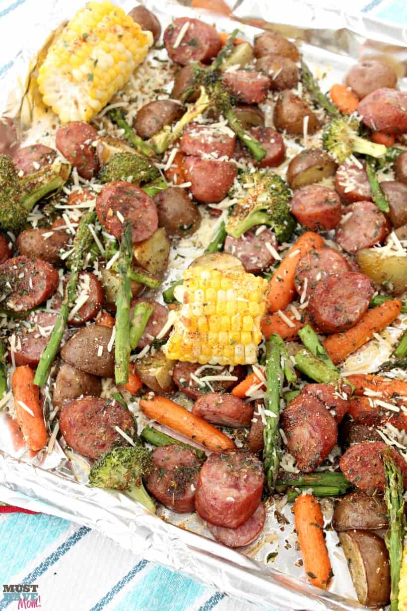 Sheet pan dinners make for easy cleanup and quick meals! This Sausage & Veggie sheet pan supper recipe is bursting with flavor and is AMAZING! One pan meal for busy nights!