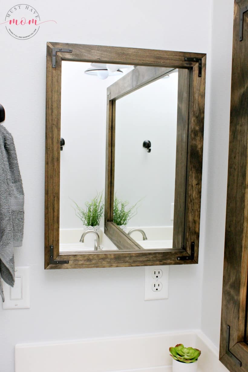 DIY vanity mirrors! Farmhouse style bathroom vanity mirror and medicine cabinet upgrade with step by step tutorial!