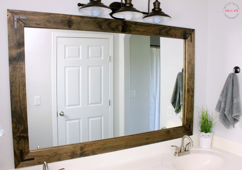 DIY vanity mirrors! Farmhouse style bathroom vanity mirror and medicine cabinet upgrade with step by step tutorial!