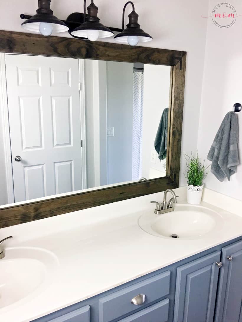 DIY vanity mirrors! Farmhouse style bathroom vanity mirror and medicine cabinet upgrade with step by step tutorial!
