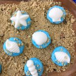 Quick and easy seashell cookies for a beach party! Fun Moana party themed shell oreos party food recipe.