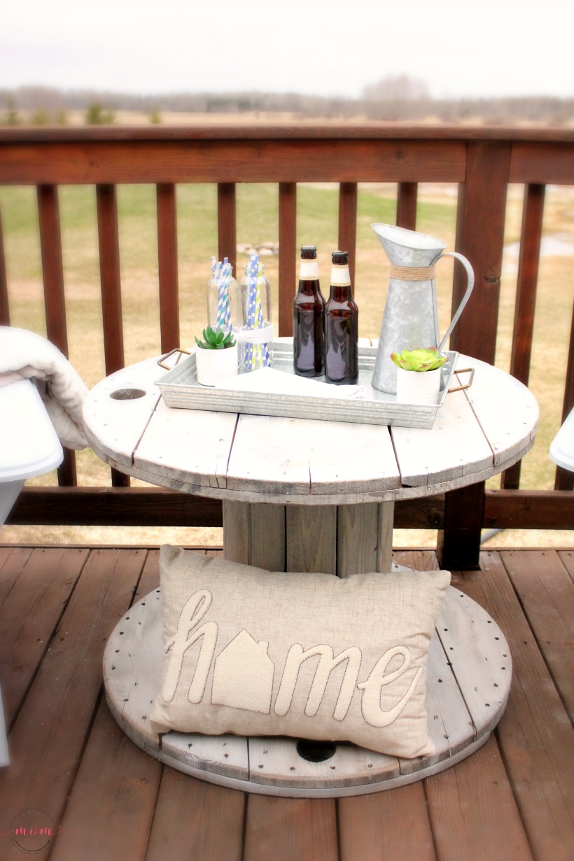 Weathered wooden spool used as side table.  Large wooden spools, Spool  furniture, Wooden spool tables