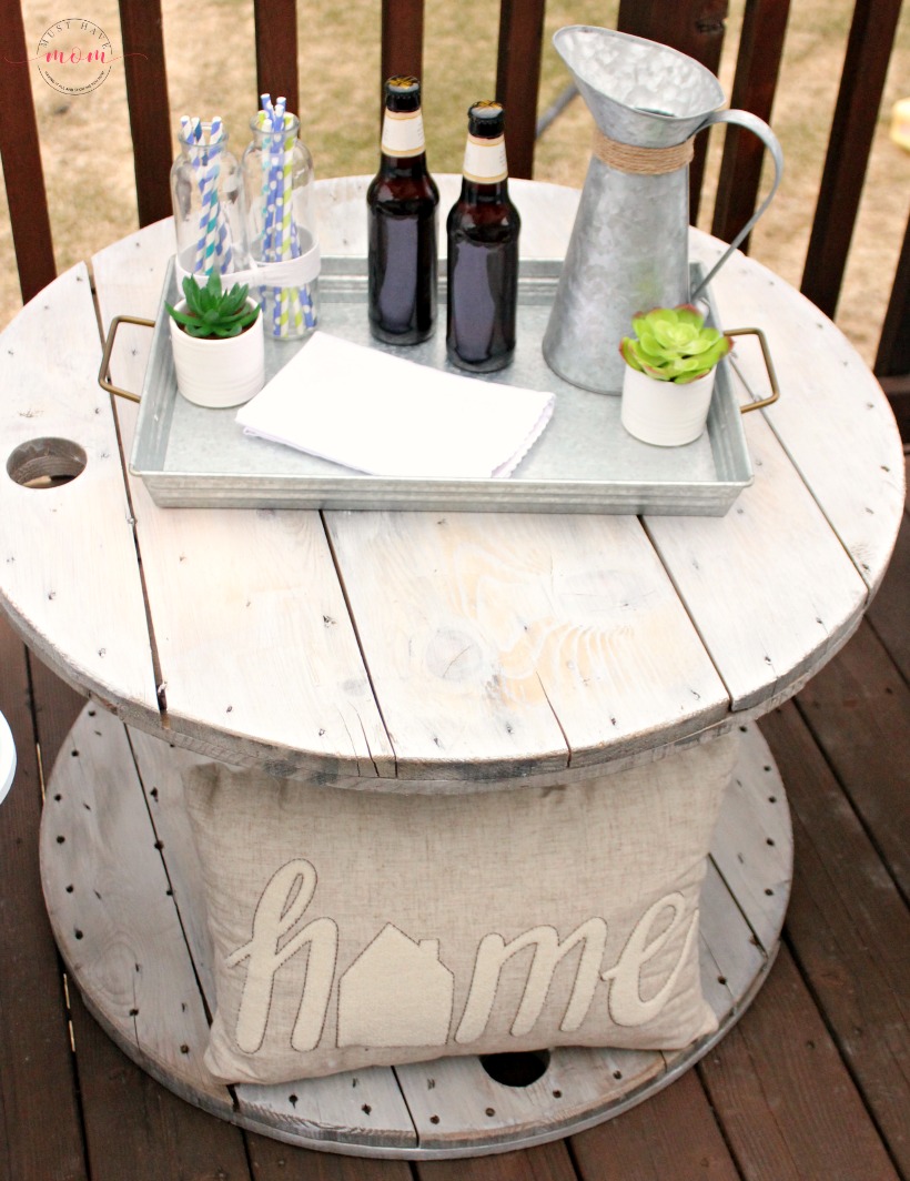 Weathered wooden spool used as side table.  Large wooden spools, Spool  furniture, Wooden spool tables