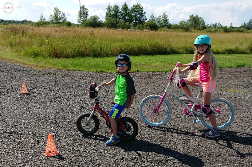 Teach your kids bike safety through play! Fun activity to decorate bike helmet, free printable bicycle license and cone course!