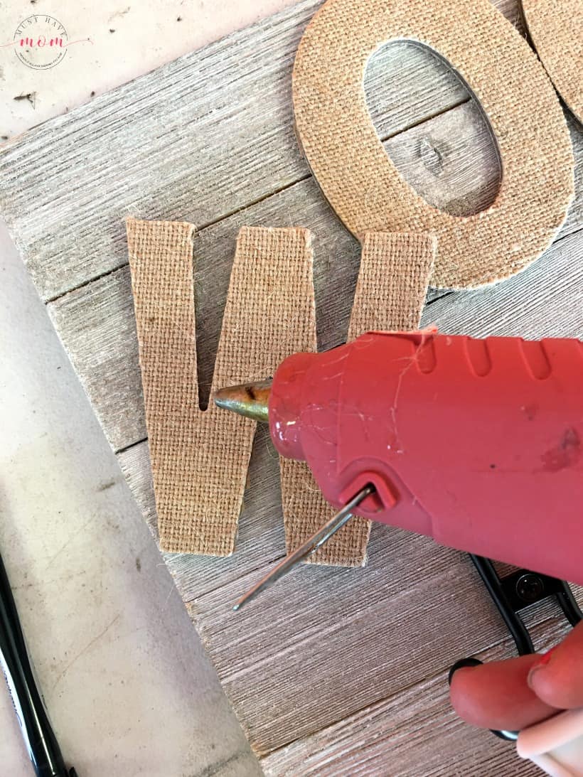 DIY Dog sign with treat jar and dog leash holder! Make this fun dog treat jar pet sign that is functional and adorable!