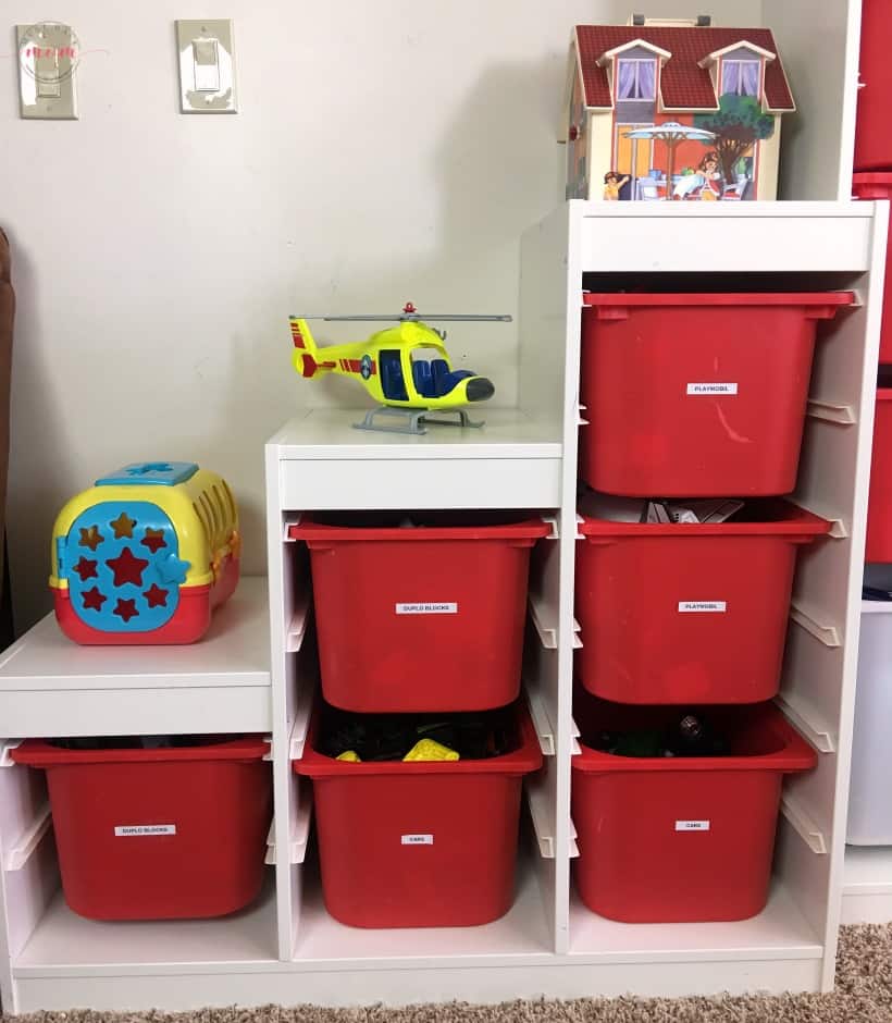 Playroom organizing tips plus how to pare down toys and see how less toys equals MORE play!