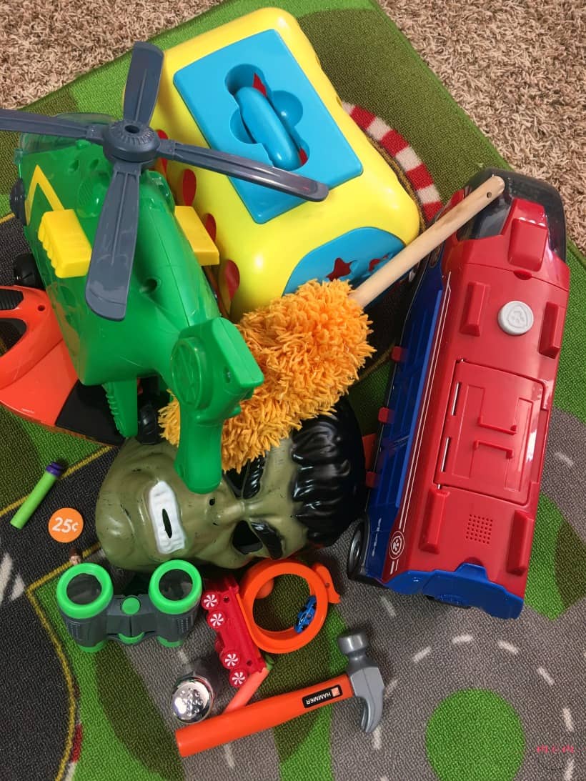 Playroom organizing tips plus how to pare down toys and see how less toys equals MORE play!