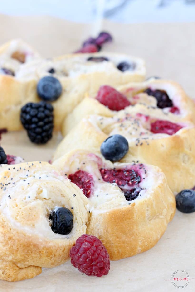 Triple berry cream cheese Pillsbury crescent roll breakfast recipe. Quick and easy breakfast idea perfect for entertaining!