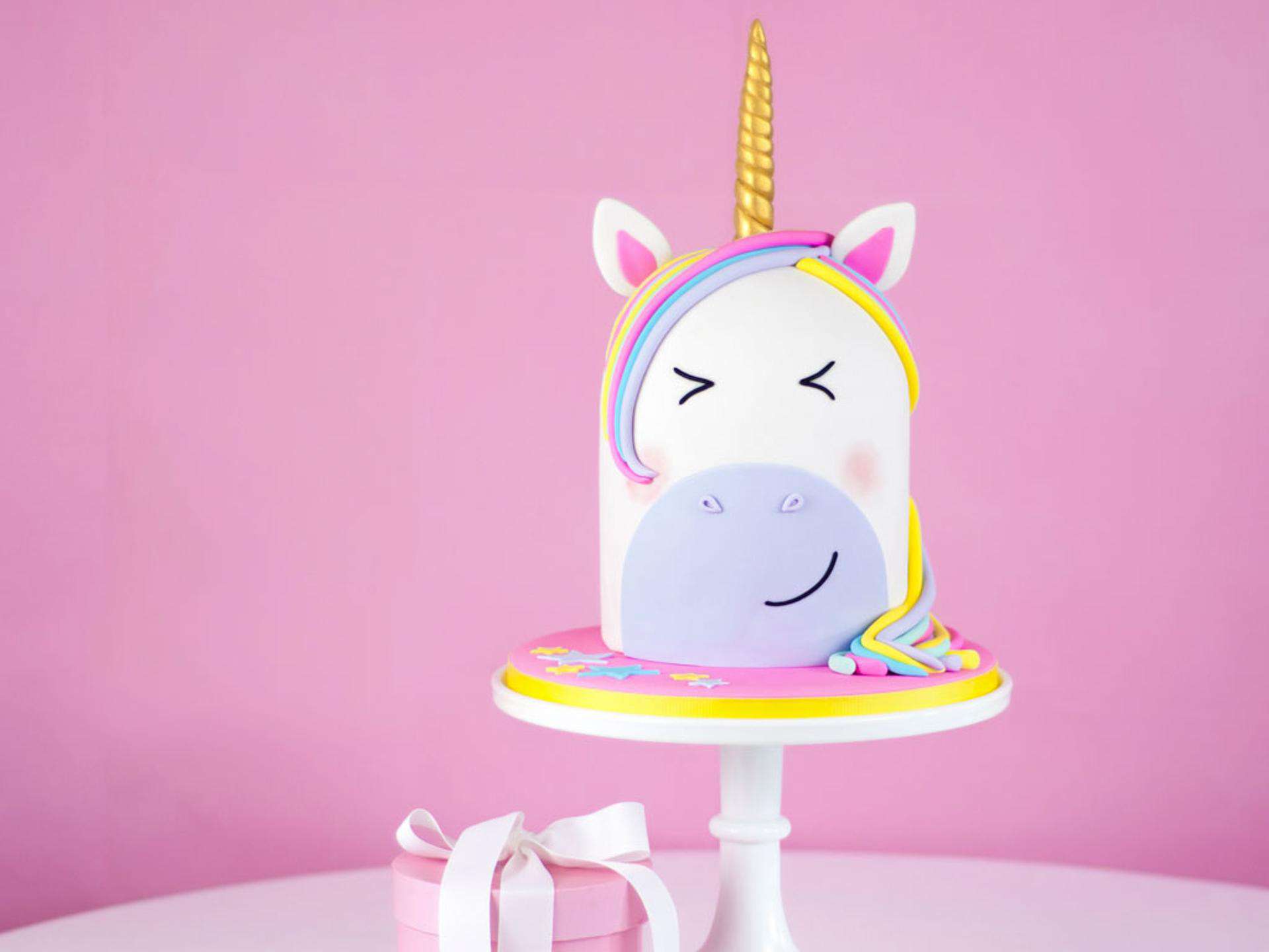 Unicorn anything is all the rage! They are magical, brightly colored, and oh so fun. This Rainbow Unicorn Cake is simply amazing. Bright colors, a gold horn, and fondant galore. 