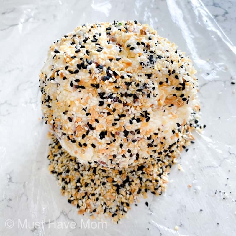 roll the cheese ball in bagel seasoning