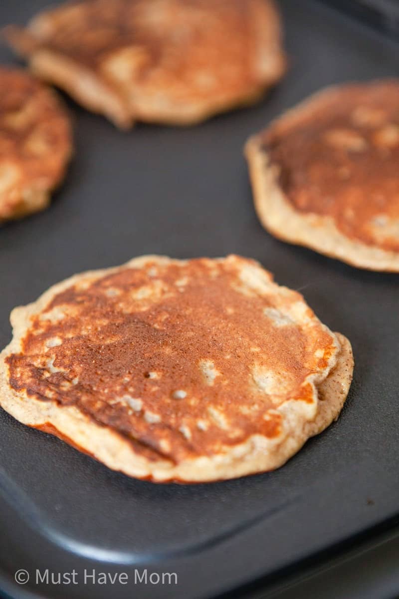 cook dairy free pancakes on a griddle