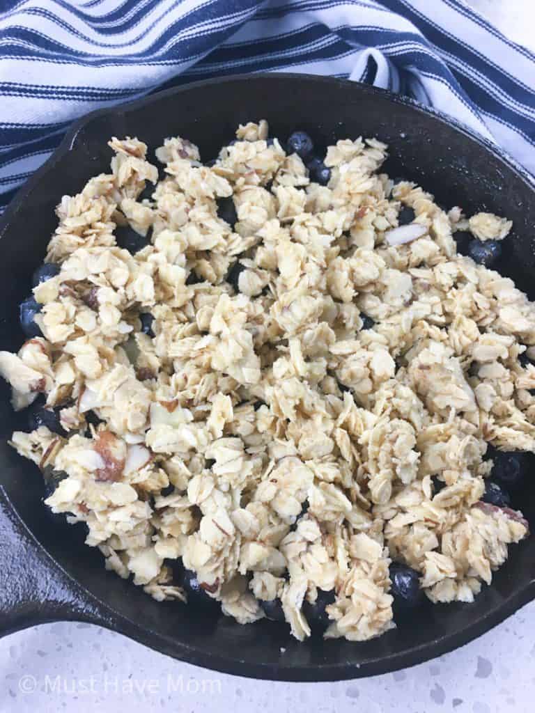 blueberry cobbler in cast iron pan